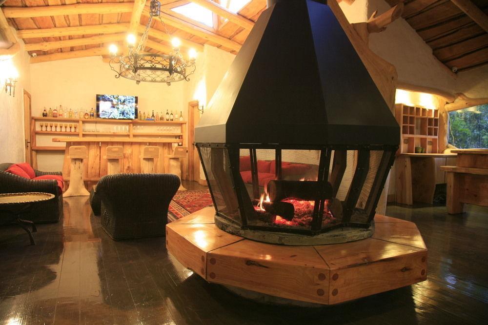 Tree Lodge Nidos De Пукон Экстерьер фото