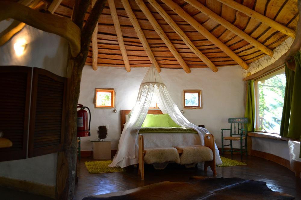Tree Lodge Nidos De Пукон Экстерьер фото