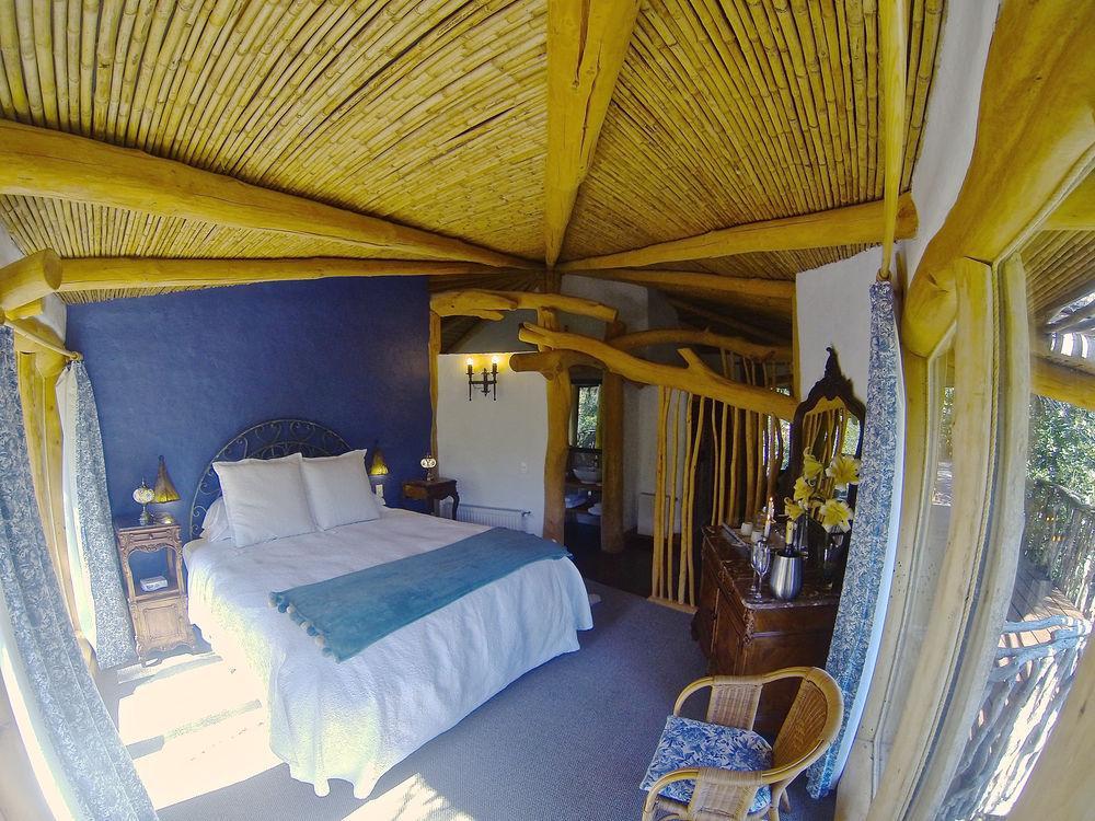 Tree Lodge Nidos De Пукон Экстерьер фото