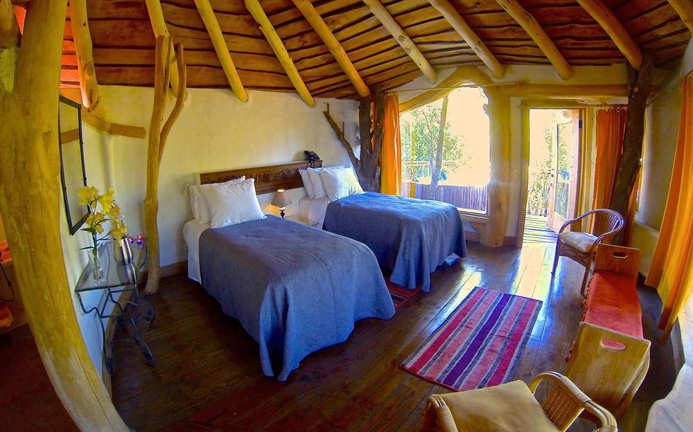 Tree Lodge Nidos De Пукон Экстерьер фото