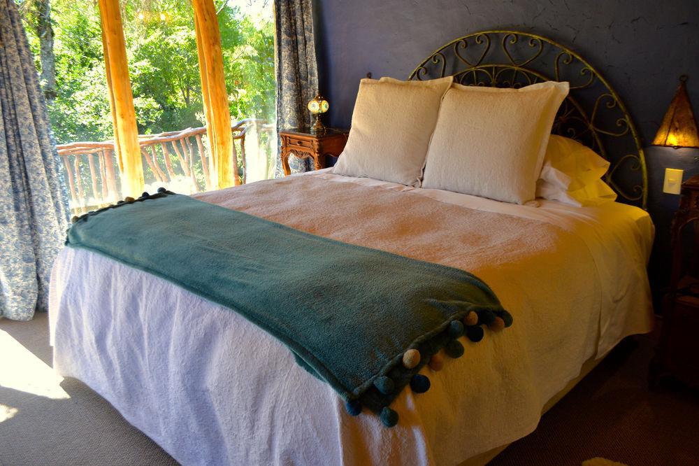 Tree Lodge Nidos De Пукон Экстерьер фото