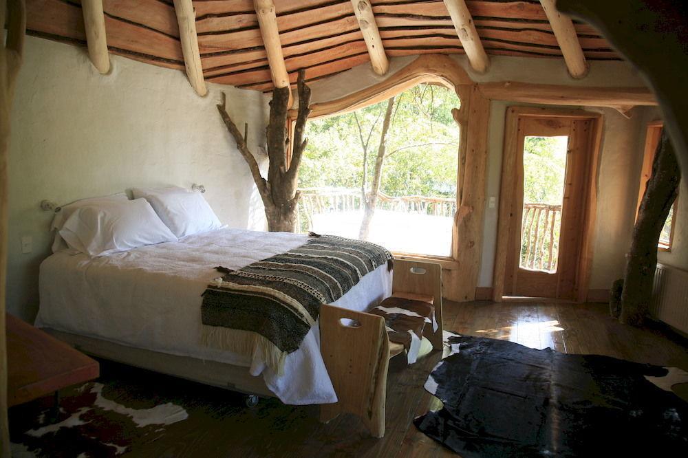 Tree Lodge Nidos De Пукон Экстерьер фото