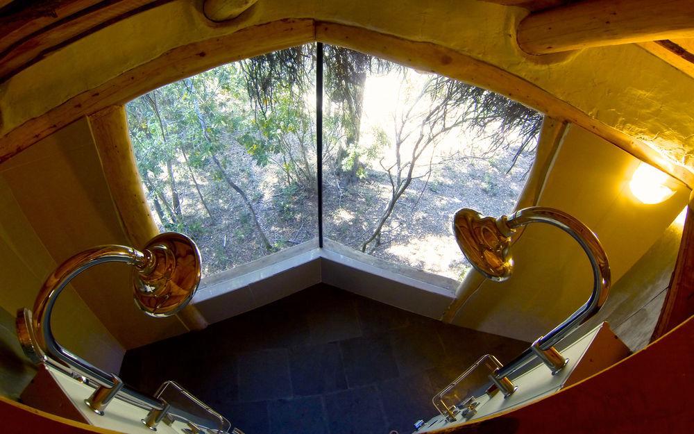 Tree Lodge Nidos De Пукон Экстерьер фото