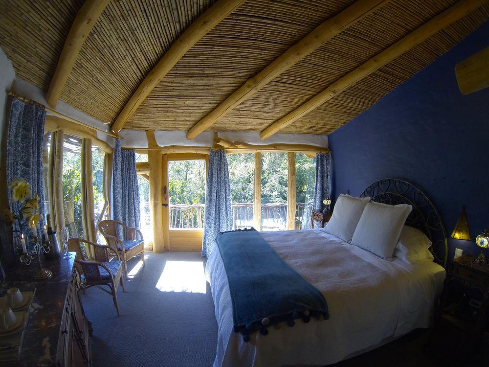 Tree Lodge Nidos De Пукон Экстерьер фото